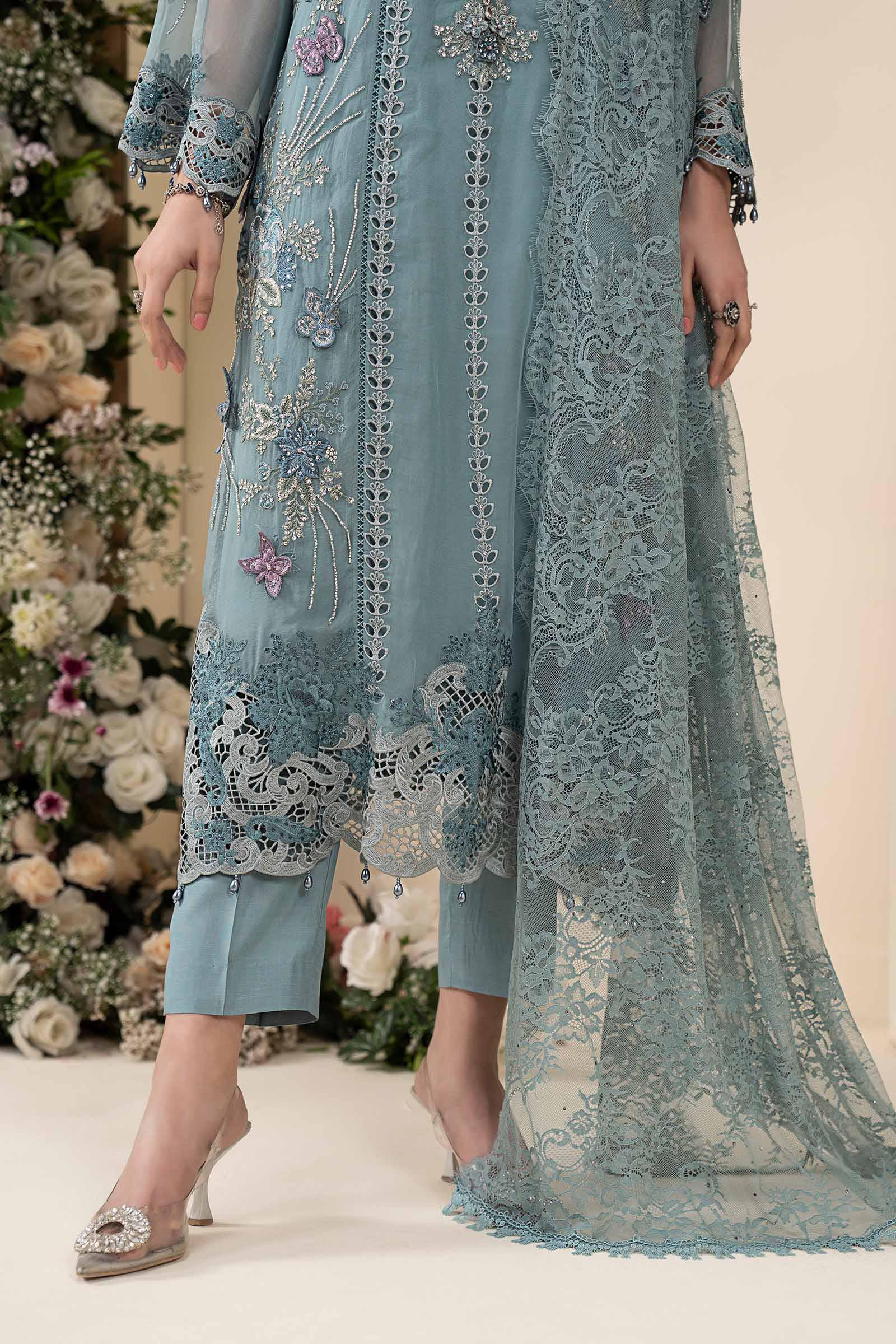Maria B MCS-26-106 Aqua Chiffon Suit with 3D embroidery, pearl drops, and included tassels and beadwork, available in stitched and unstitched versions.