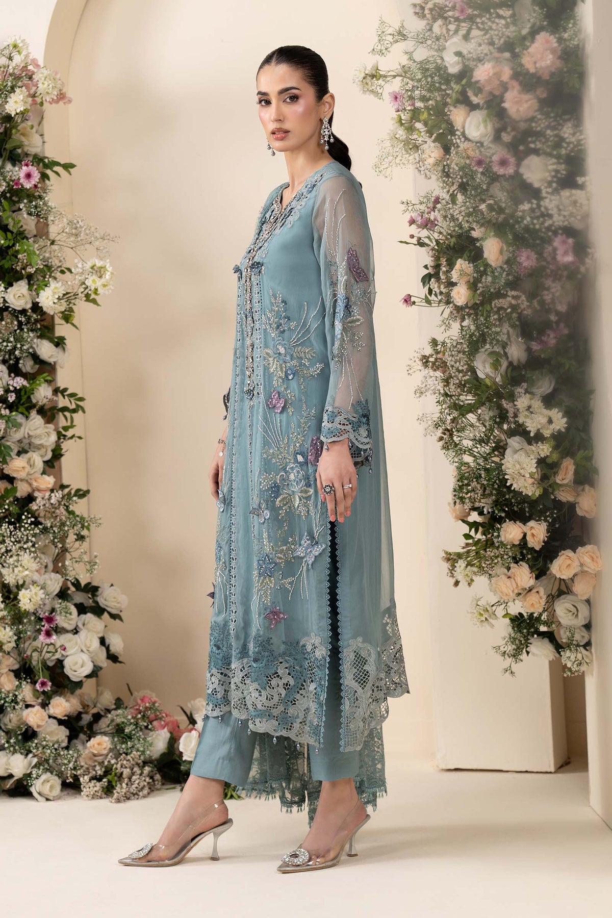 Maria B MCS-26-106 Aqua Chiffon Suit with 3D embroidery, pearl drops, and included tassels and beadwork, available in stitched and unstitched versions.
