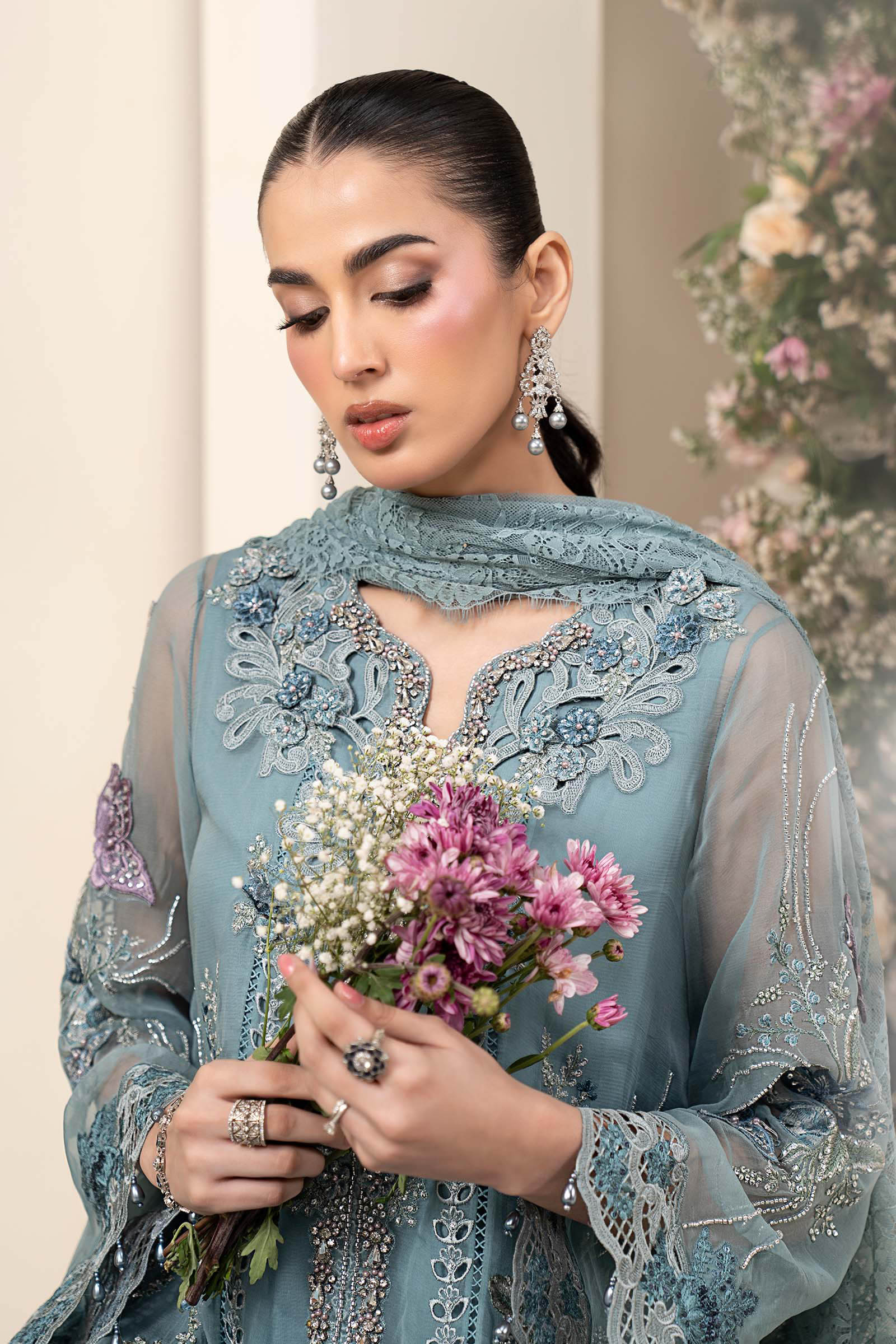 Maria B MCS-26-106 Aqua Chiffon Suit with 3D embroidery, pearl drops, and included tassels and beadwork, available in stitched and unstitched versions.