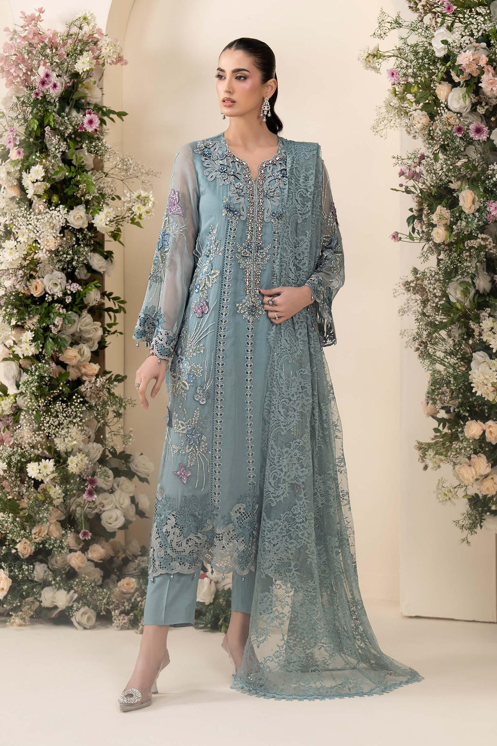 Maria B MCS-26-106 Aqua Chiffon Suit with 3D embroidery, pearl drops, and included tassels and beadwork, available in stitched and unstitched versions.