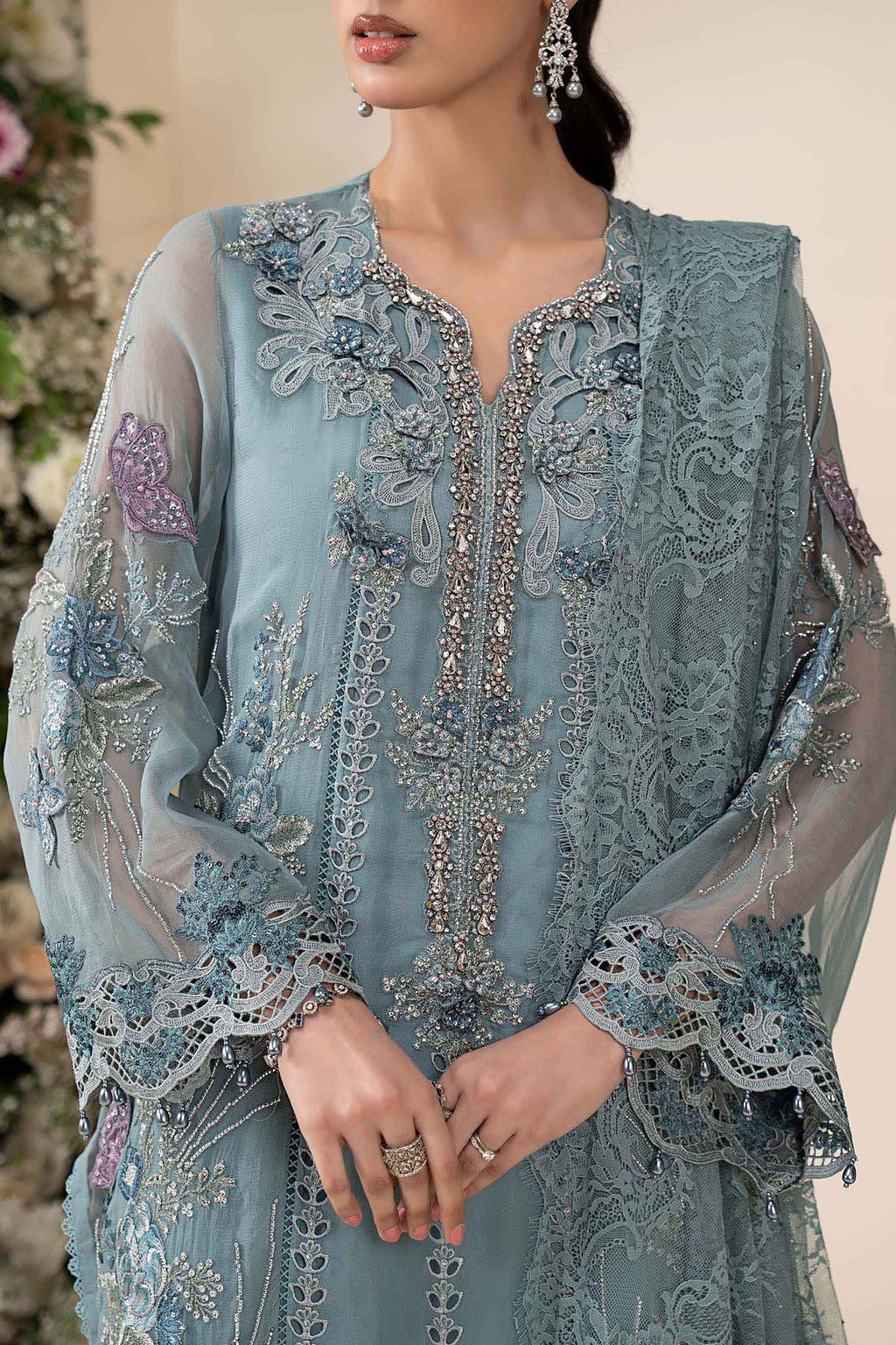 Maria B MCS-26-106 Aqua Chiffon Suit with 3D embroidery, pearl drops, and included tassels and beadwork, available in stitched and unstitched versions.