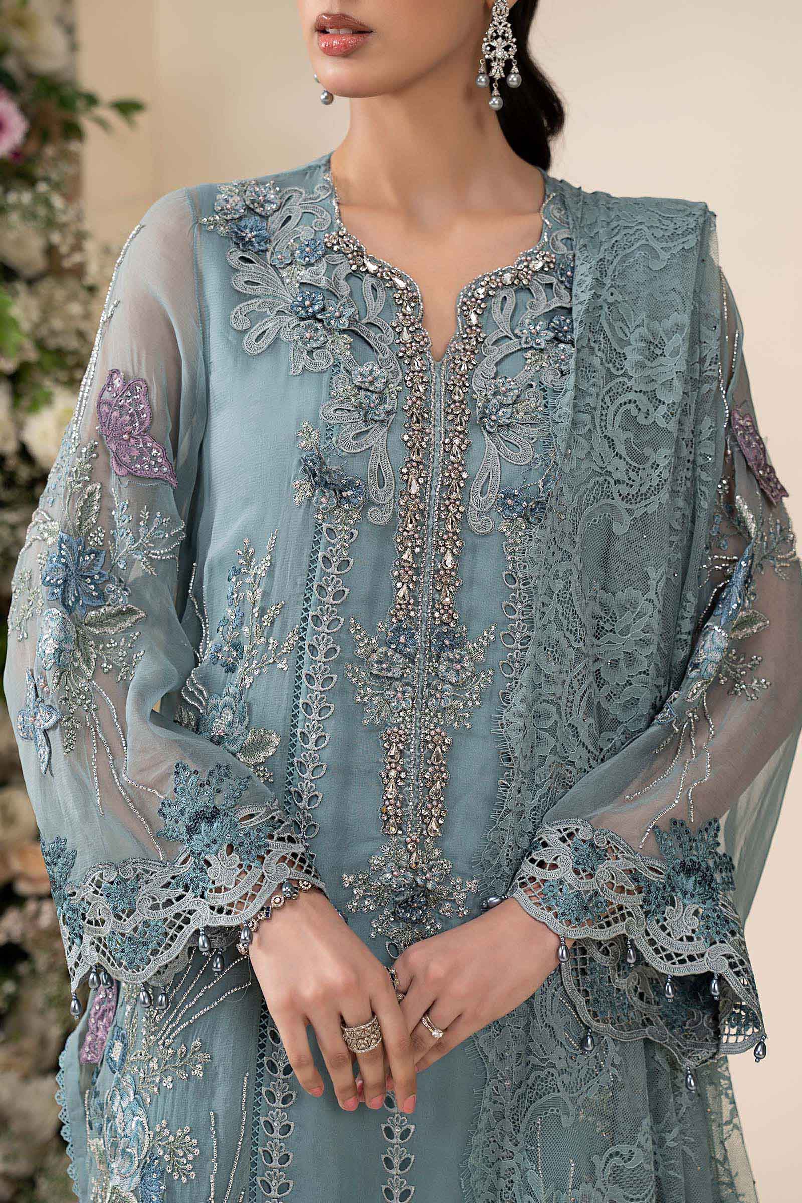 Maria B MCS-26-106 Aqua Chiffon Suit with 3D embroidery, pearl drops, and included tassels and beadwork, available in stitched and unstitched versions.