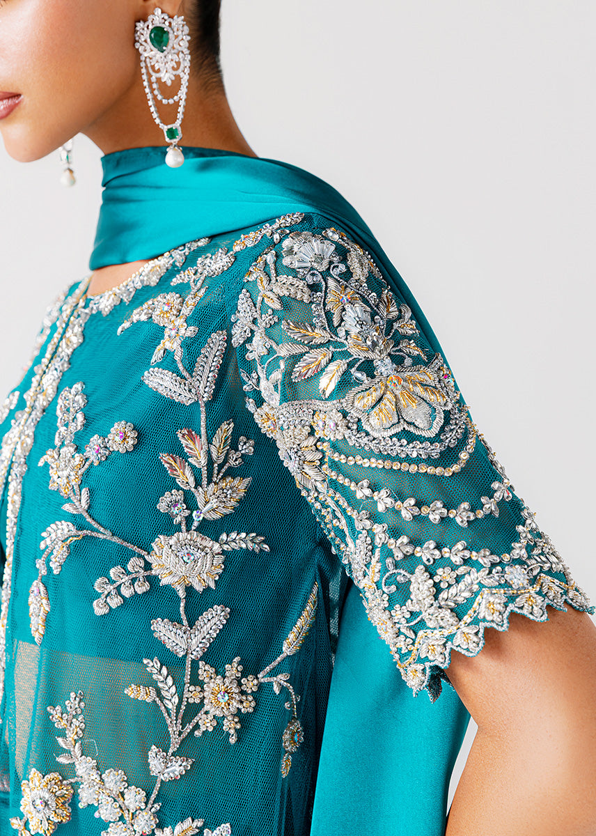 Zamrud Ayin turquoise green net gown by Sara Rohale Asghar - additional view