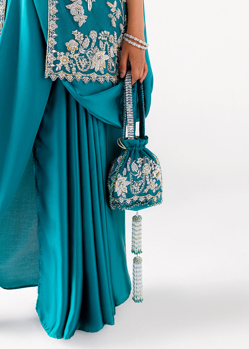 Zamrud Ayin turquoise green net gown by Sara Rohale Asghar - front view
