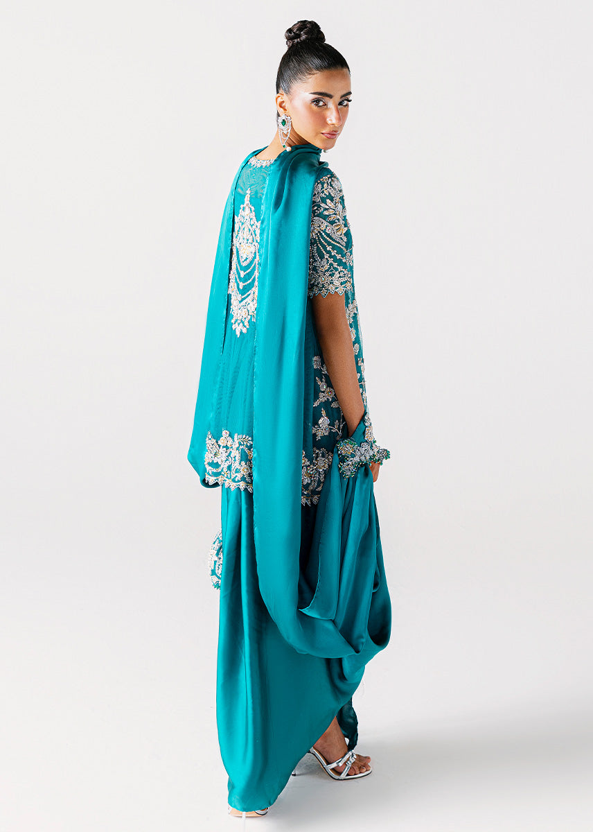 Zamrud Ayin turquoise green net gown by Sara Rohale Asghar - detail view